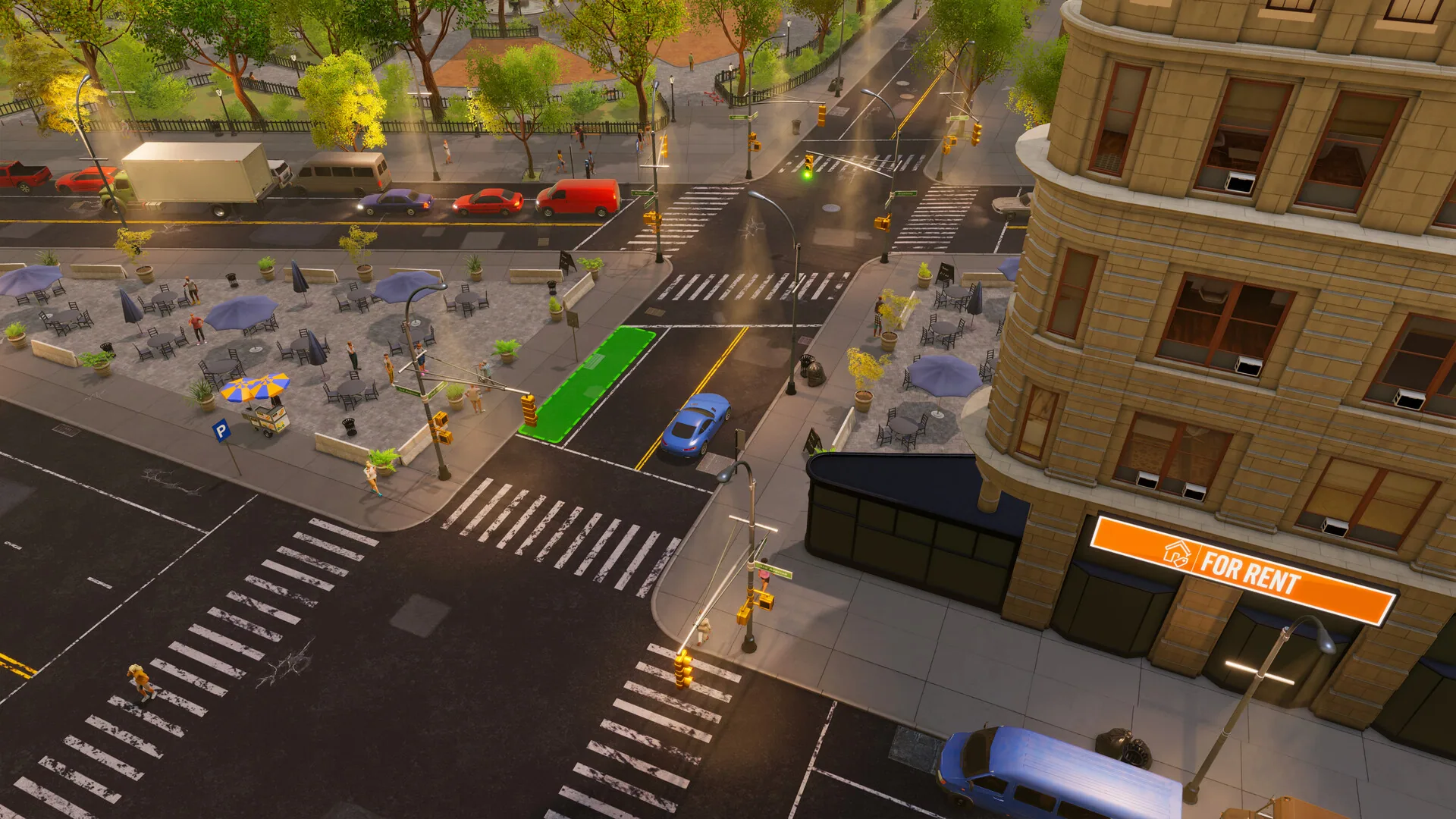 New York street corner with an orange FOR RENT sign on a ground-floor unit, cafe seating and traffic.
