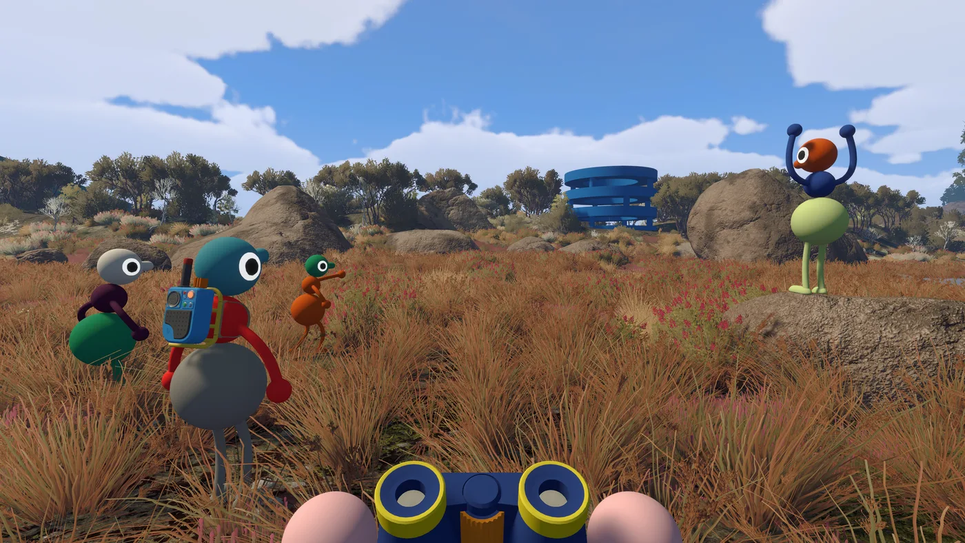First-person view through a pair of blue and yellow binoculars, framing dry grassland. Two other characters stand in the grass ahead, one wearing a backpack (June 2026 build)