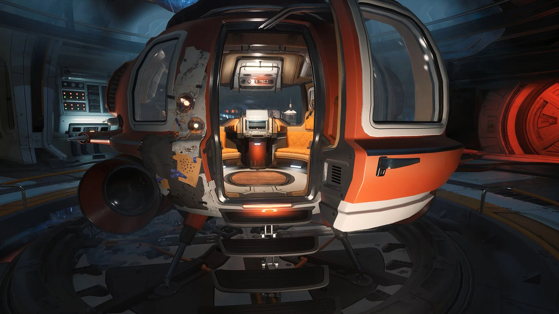 An orange-and-white shuttle with open rear doors showing orange benches and a console, docked in a station bay.
