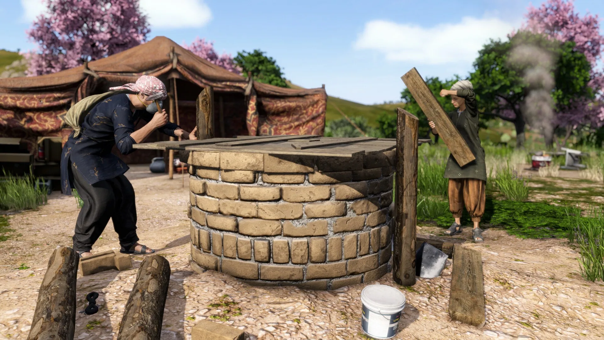 A brick well with boards across the opening