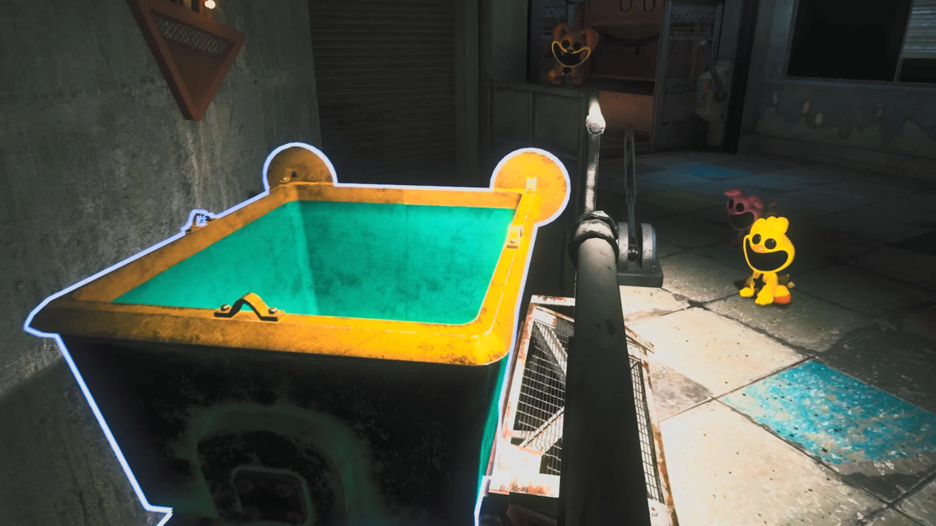 A green cart standing in a tiled factory hall