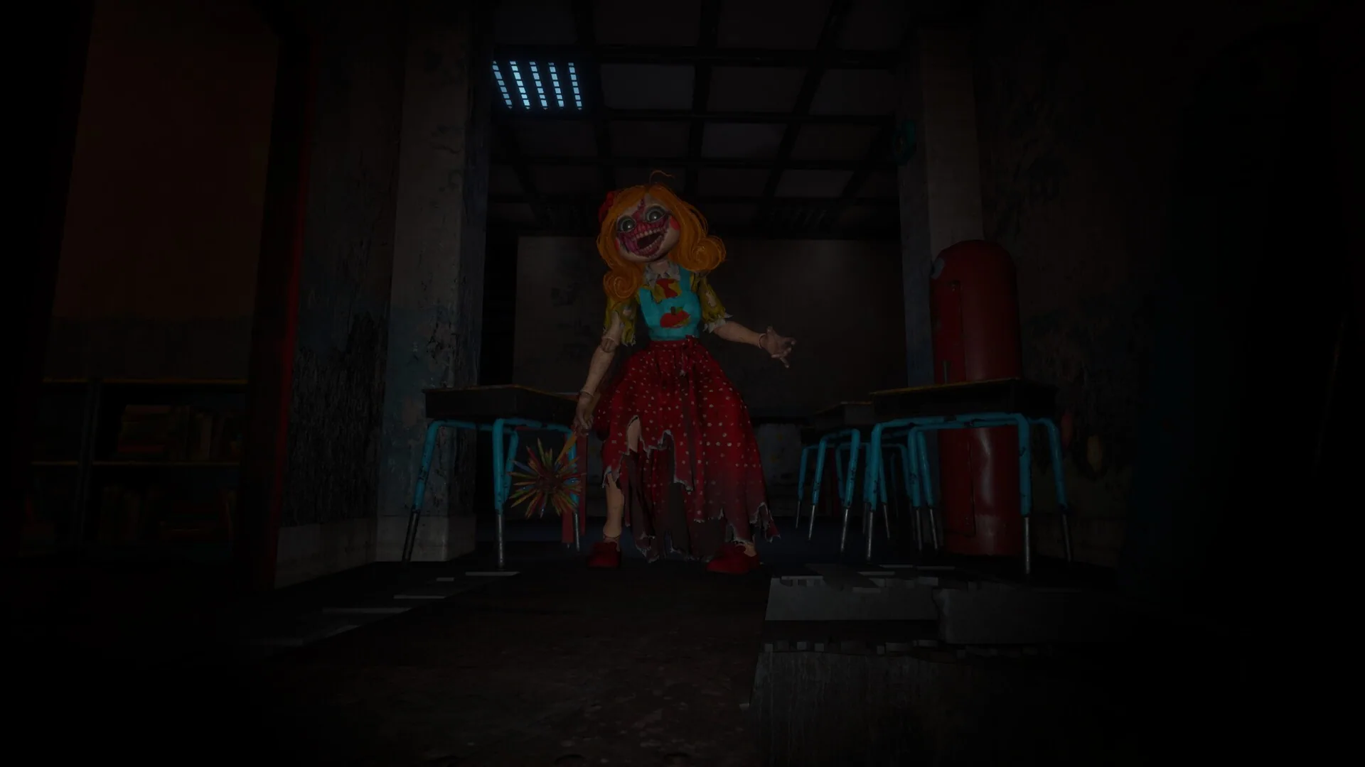 A doll in a red dress standing in a dark classroom