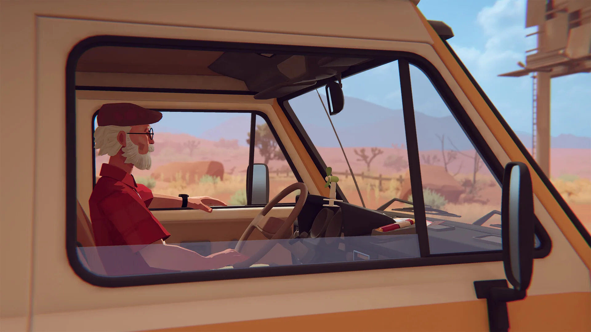 Alfred drives the van through desert scrub with a green cactus on the dash.
