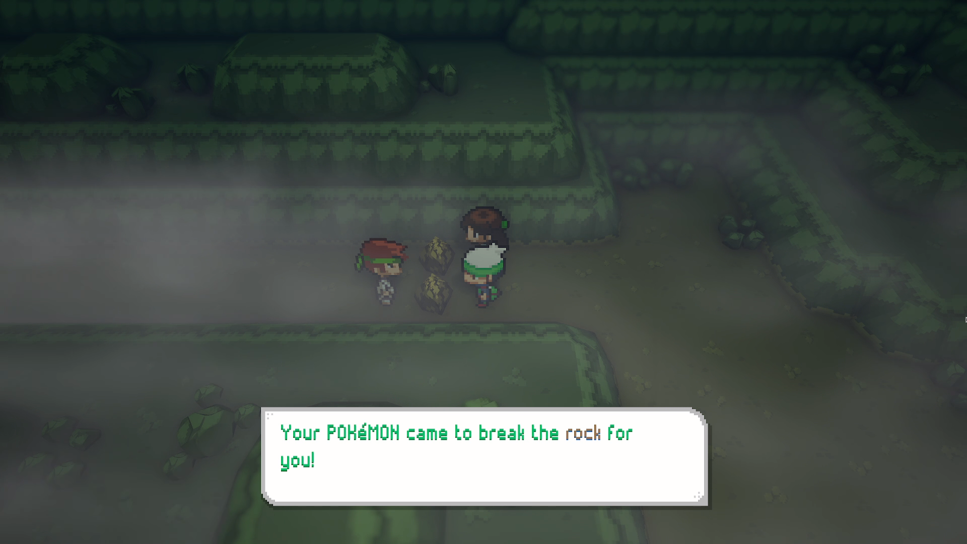 Foggy rock-face scene where a dialogue box reads Your POKÉMON came to break the rock for you!, showing automatic HM rock smash.