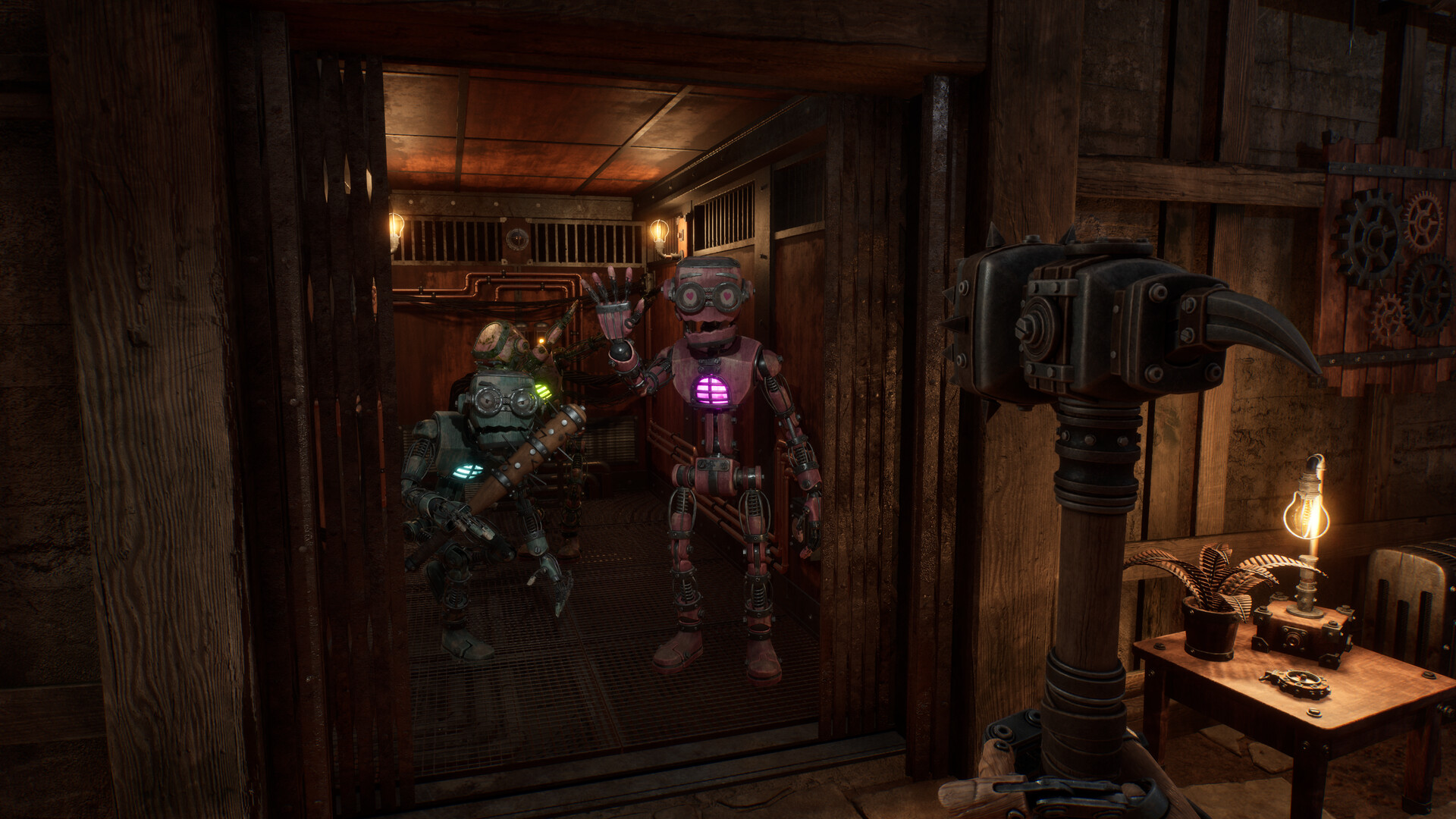 View from a wood-panelled room into a lit metal elevator car where two vessels wait, one with a glowing magenta chest core and one in dark armour with a green core; the player’s clawed tool is raised at the right.