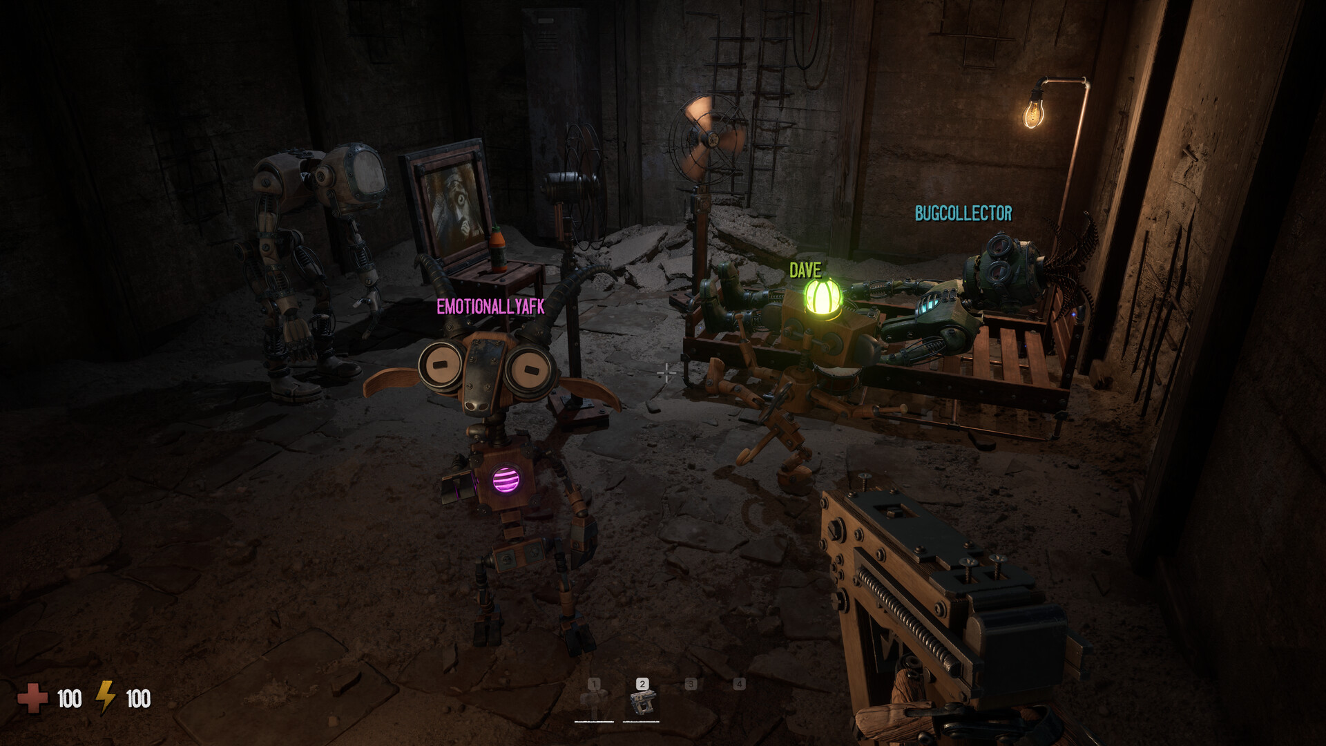 A party in a ruined stone room: the vessel EMOTIONALLYAFK with a lit magenta chest core in the foreground, DAVE with a green core at a workbench and BUGCOLLECTOR further right, each under a nameplate, with the player’s weapon and a four-slot hotbar at the bottom of the frame.
