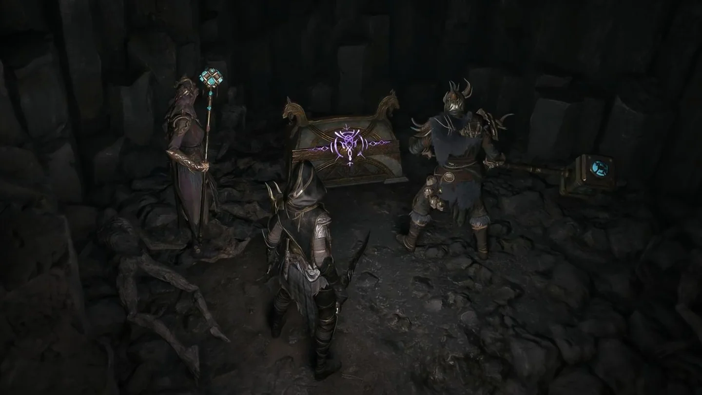 A three-player squad opening a vault-like chest