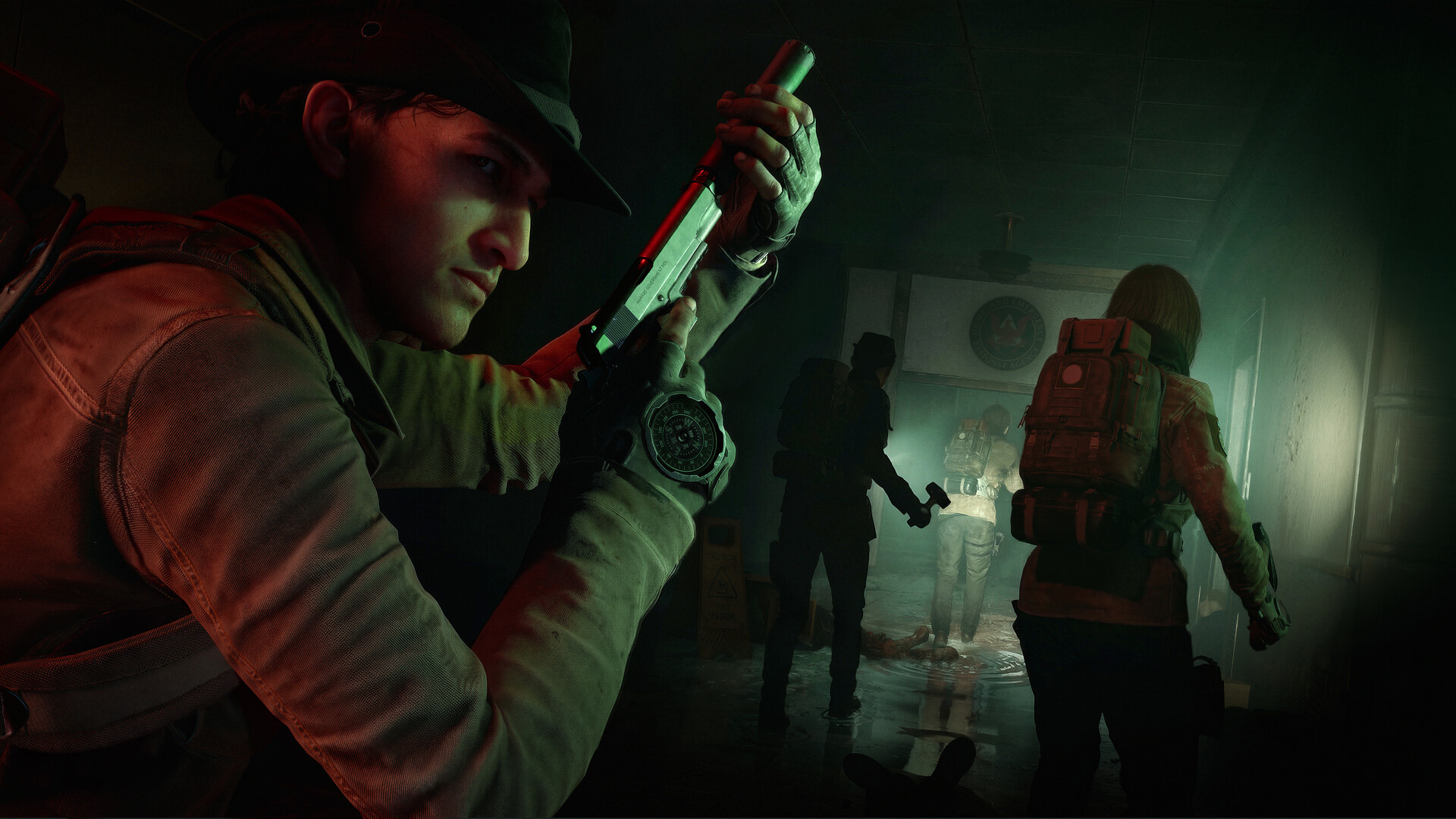 Official Steam screenshot of a hat-wearing Responder checking a pistol while a squad advances down a flooded institutional hallway.