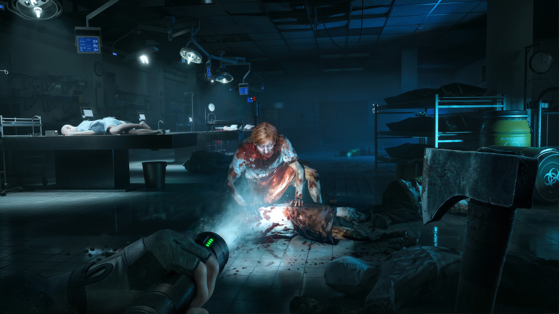 Official Steam screenshot of a dark hospital morgue where a bloodied figure crouches over a body under a flashlight, with a fire axe in the foreground.