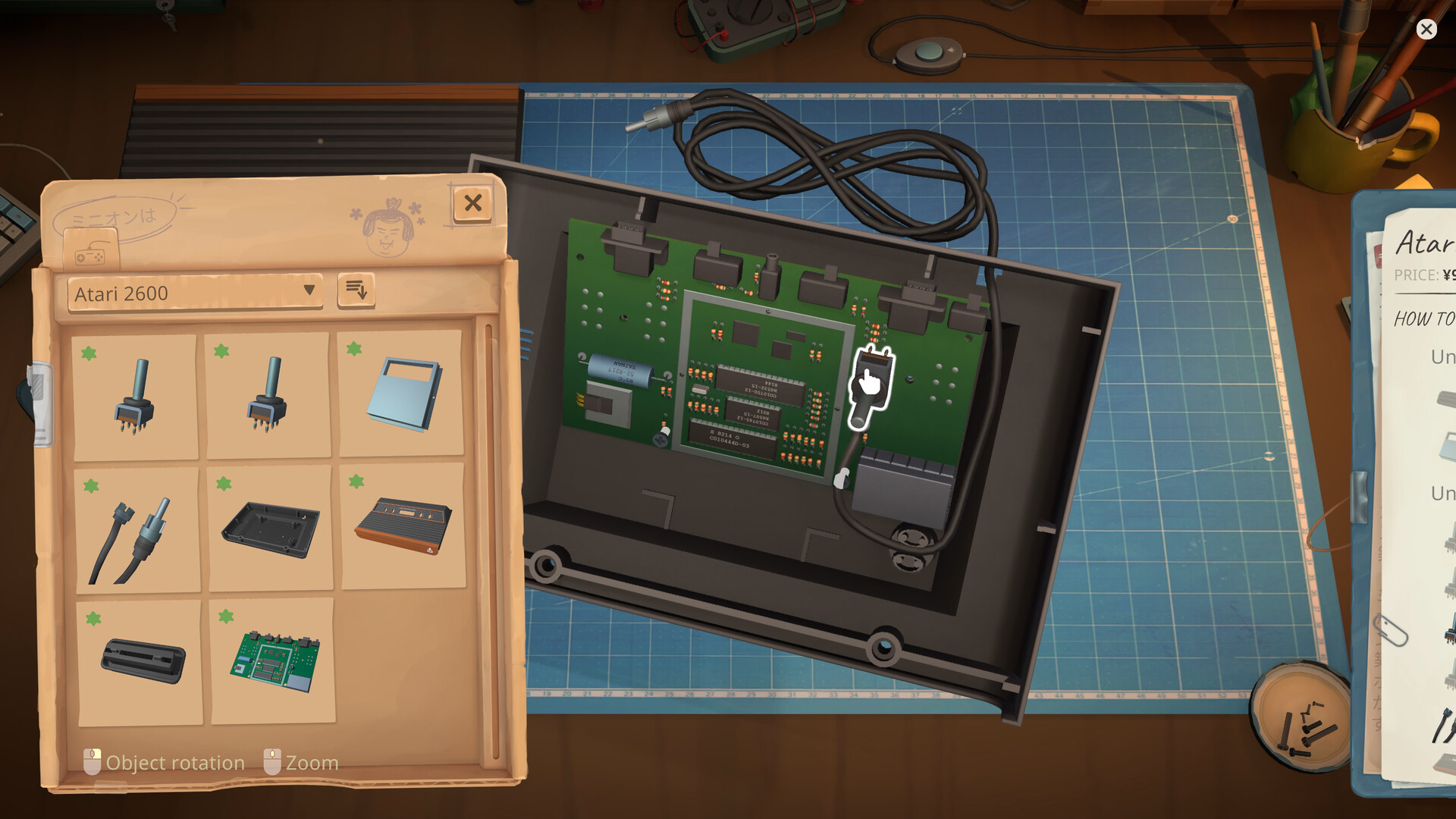 Atari 2600 opened on the repair mat beside its motherboard, parts and an Atari parts list.