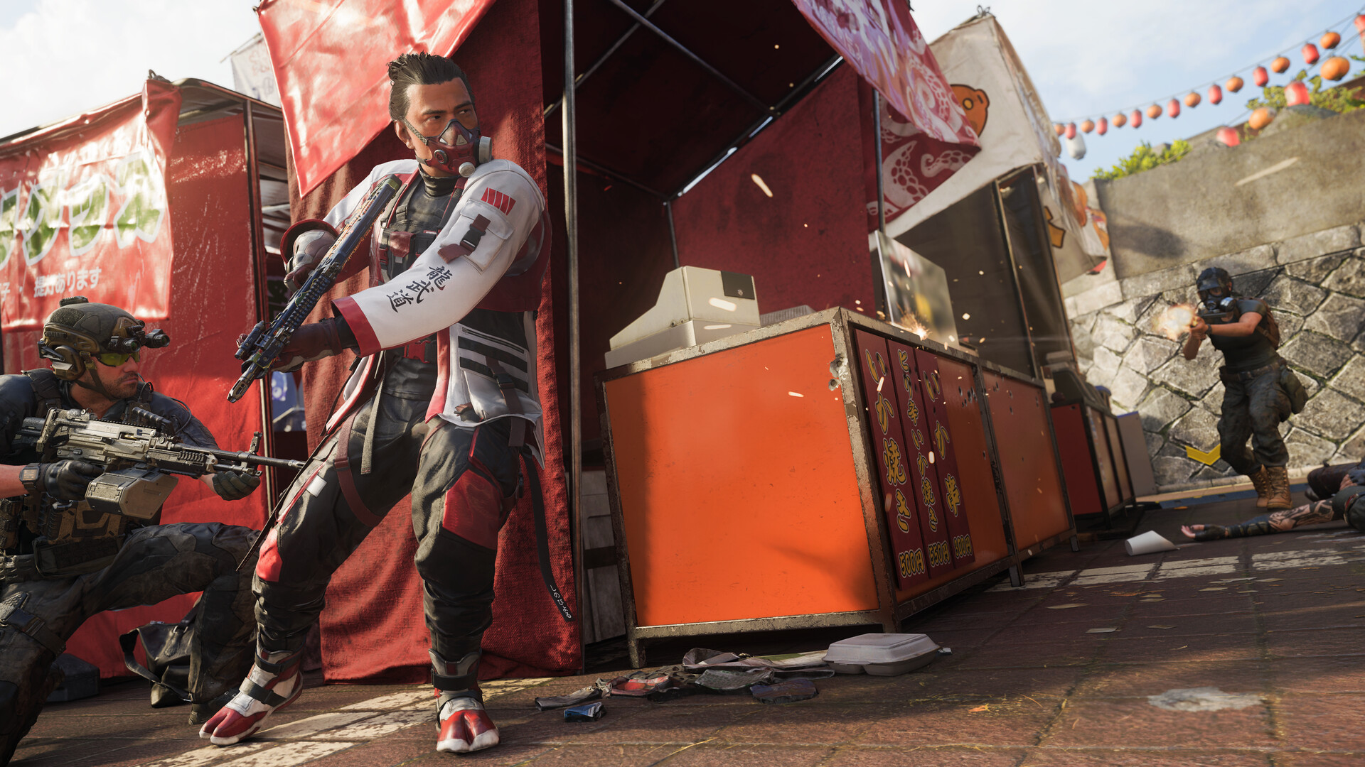 An operator in a red-and-white happi coat fights beside a festival food stall while teammates shoot from cover.
