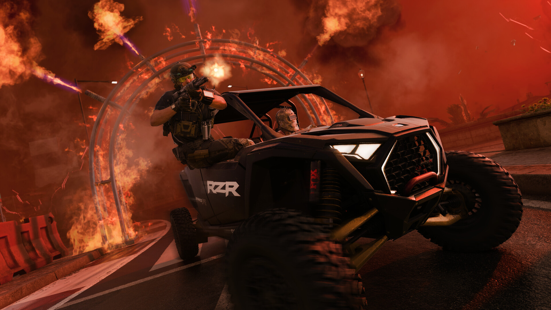 A gunner in an RZR dune buggy fires through a ring of flames on a smoke-red street.