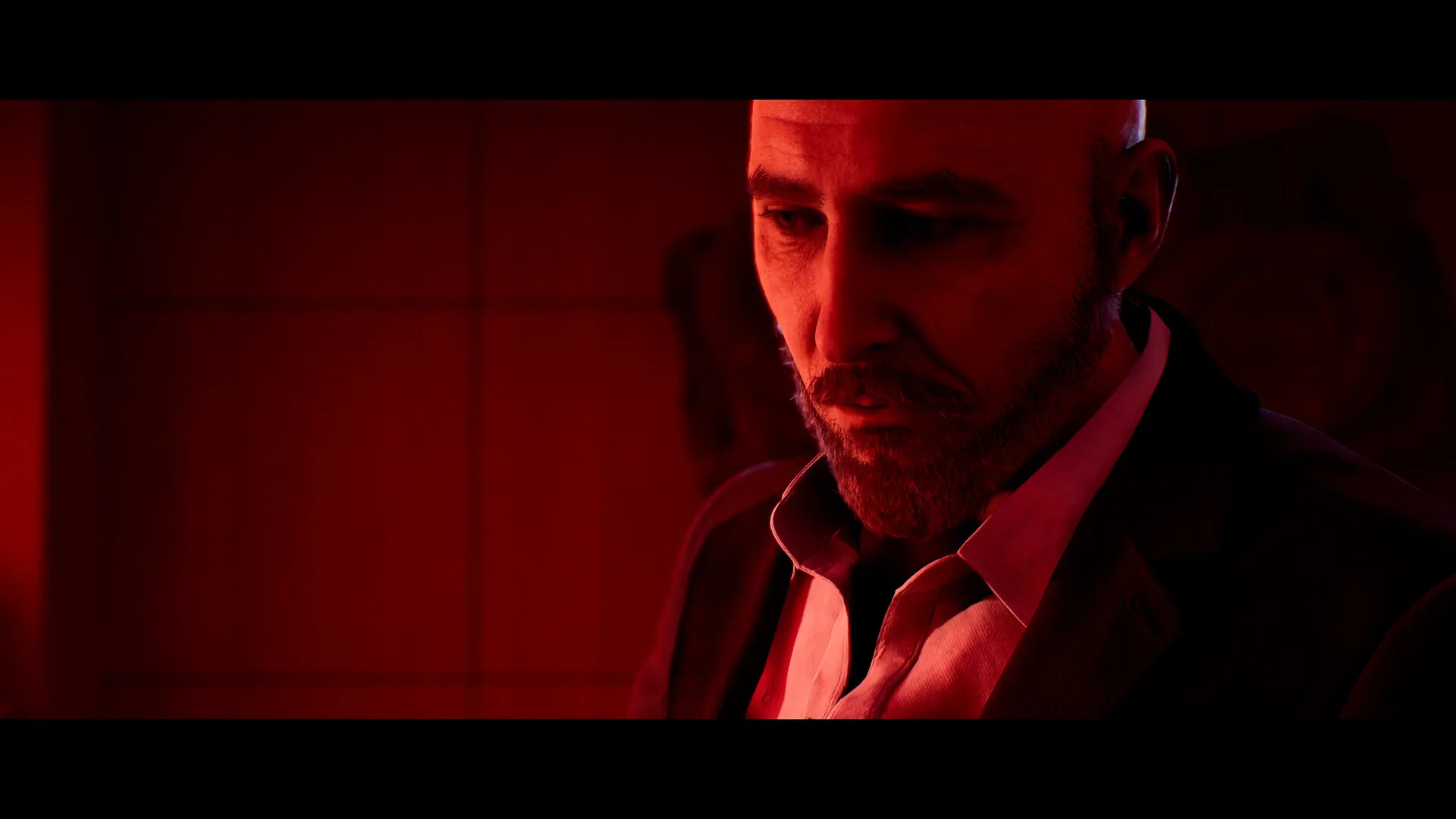 First-person firearm stance in a dim corridor.