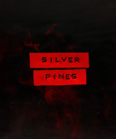 Red Walker and the threat surrounding Silver Pines share the same frame.