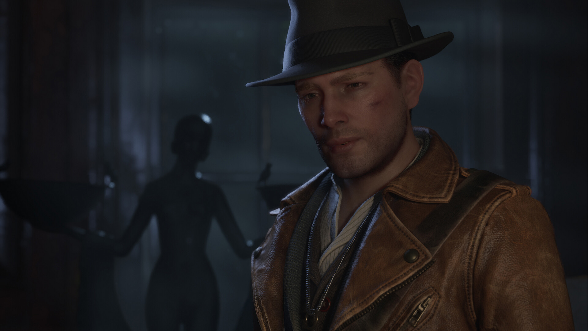 Close-up of Calvin Rafferty in a brown leather jacket and fedora, bruised, with a silhouetted figure behind him