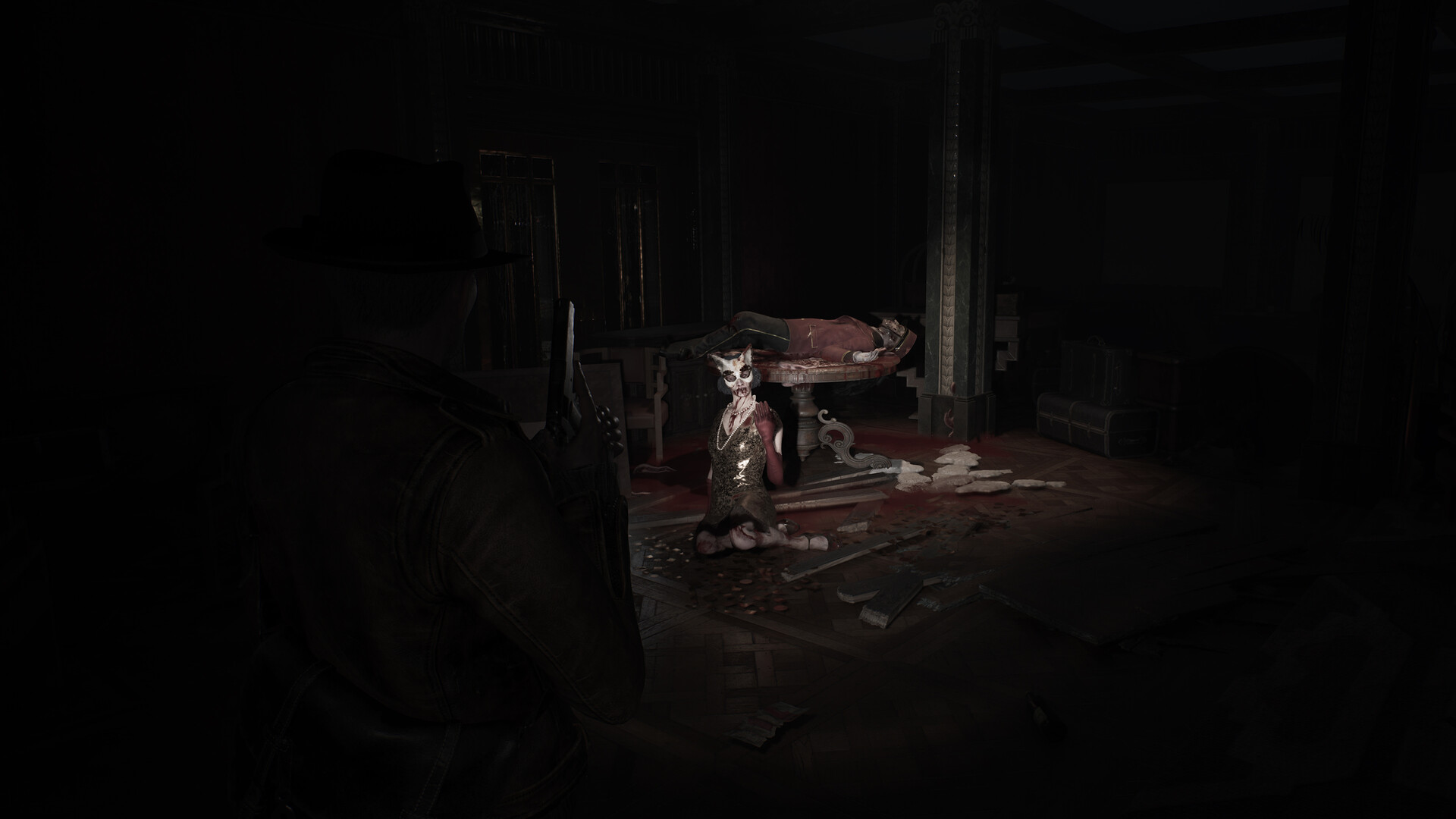Calvin Rafferty aims a pistol at a kneeling masked figure beside a body on a table in a dark ritual room