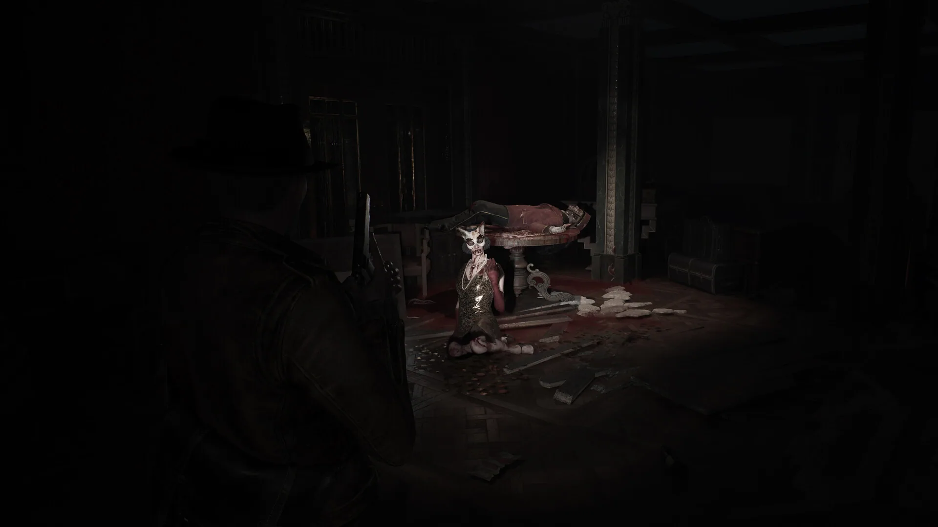 Calvin Rafferty aims a pistol at a kneeling masked figure beside a body on a table in a dark ritual room