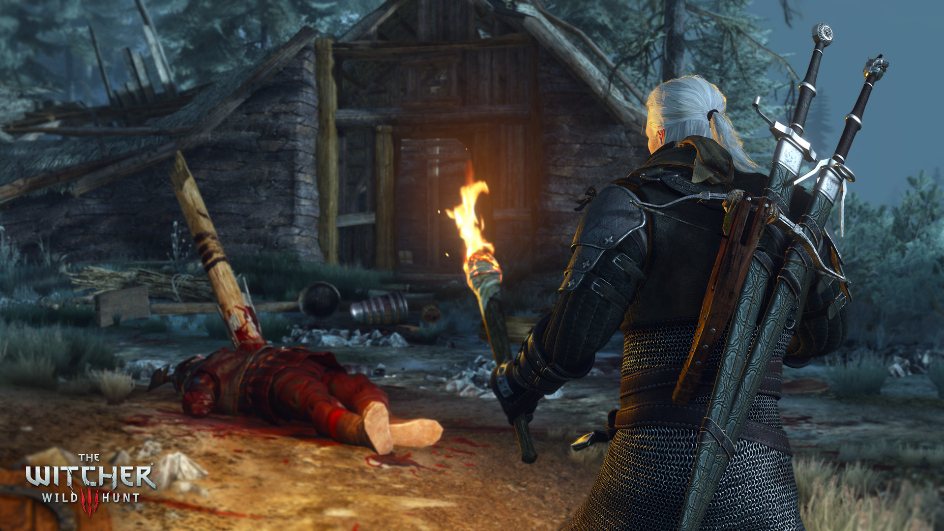 Steam gallery still: Geralt seen from behind with two swords, holding a torch toward a thatched hut; a body in red lies on the ground with a wooden stake.