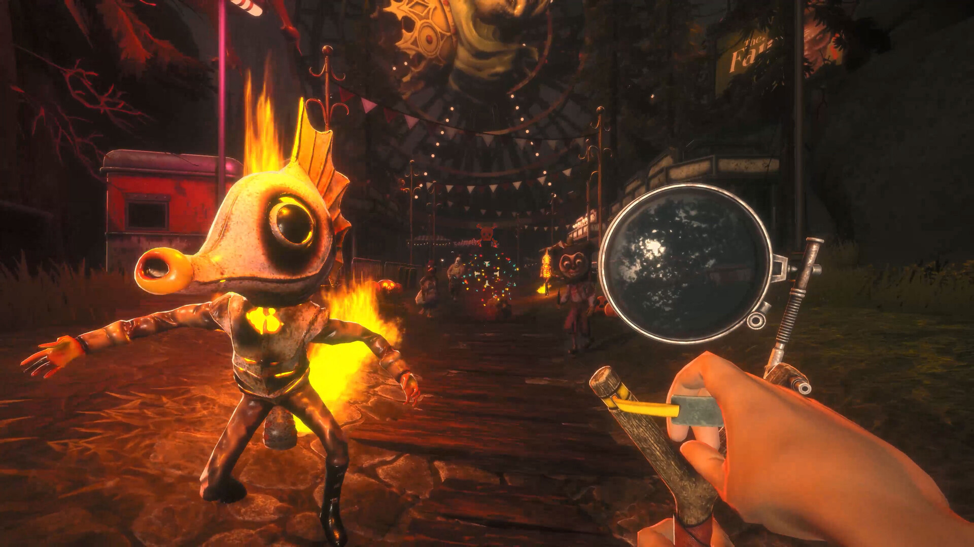 Carnival midway with a burning fish-headed mascot, a ferris wheel, and a sniper slingshot in the player's hands.