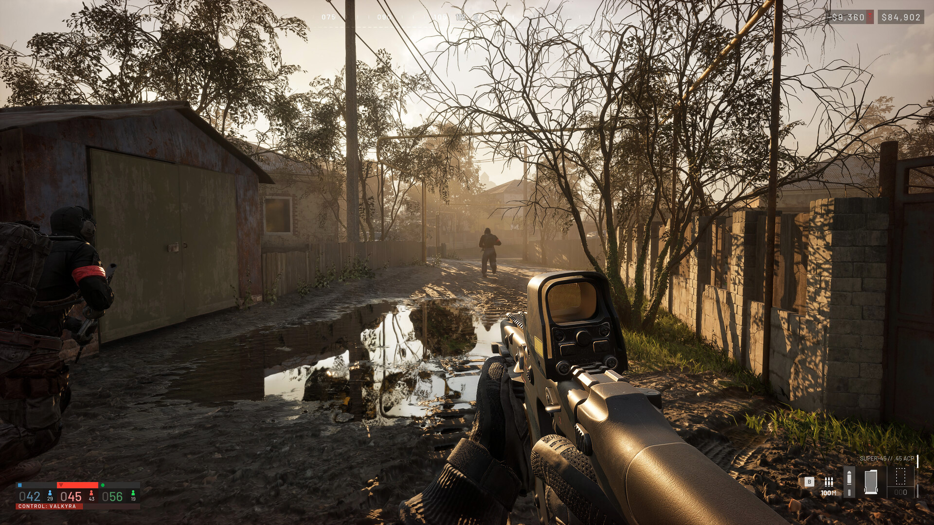 Steam WARDOGS 截图：第一人称步枪、队友与 HUD 位于泥泞的住宅道路；HUD 显示 VALKYRA 控制区。
