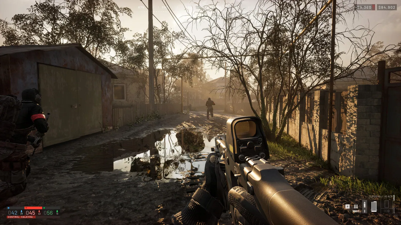 Steam WARDOGS 截图：第一人称步枪、队友与 HUD 位于泥泞的住宅道路；HUD 显示 VALKYRA 控制区。